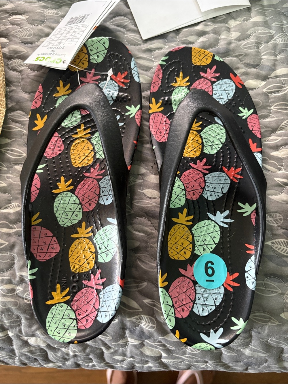 Brand new Crocs Women’s Pineapple Print Black Flip Flop Sandals size 6